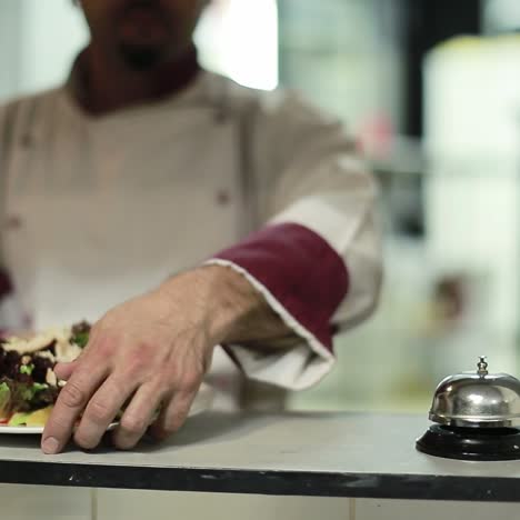 cook man pressing a bell indoor