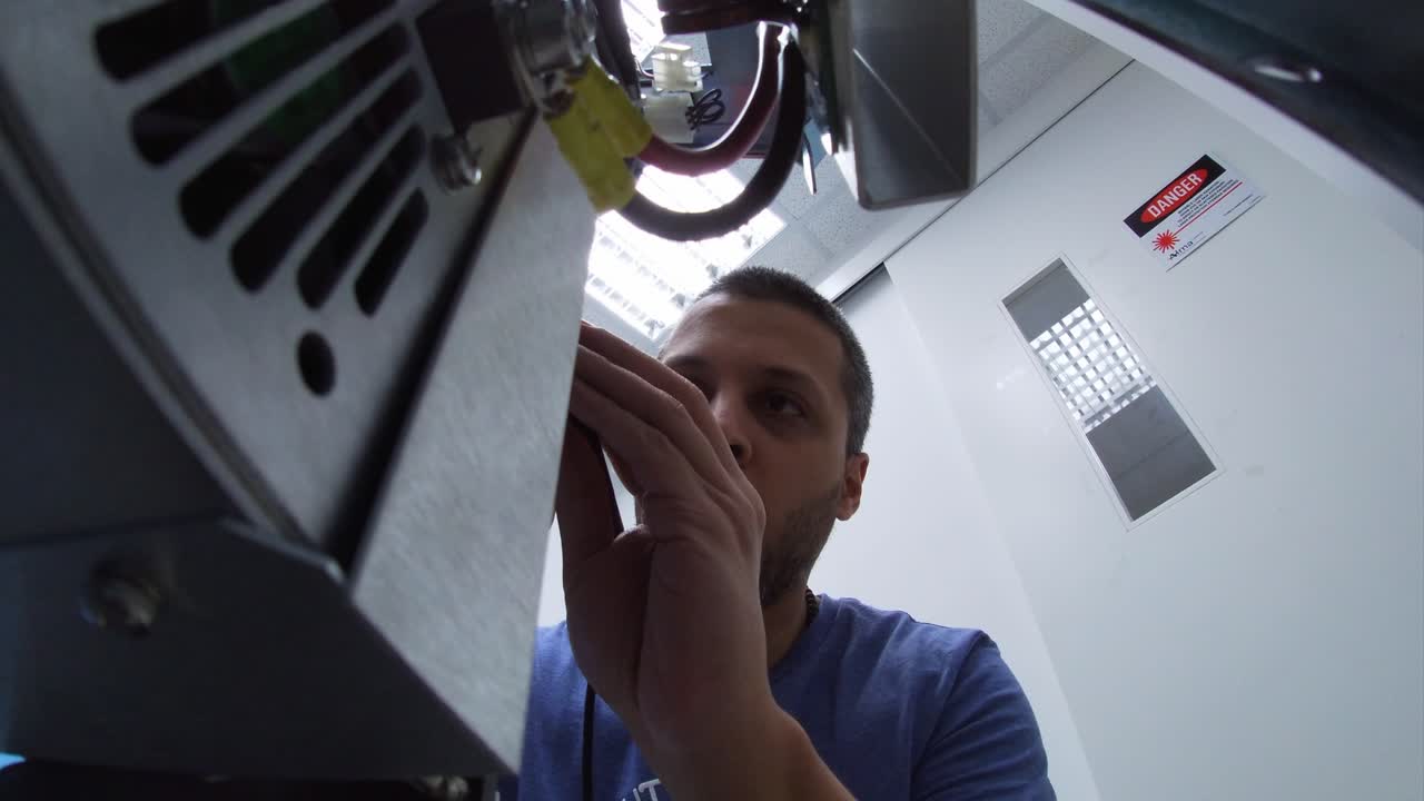 Man working on electrical equipment