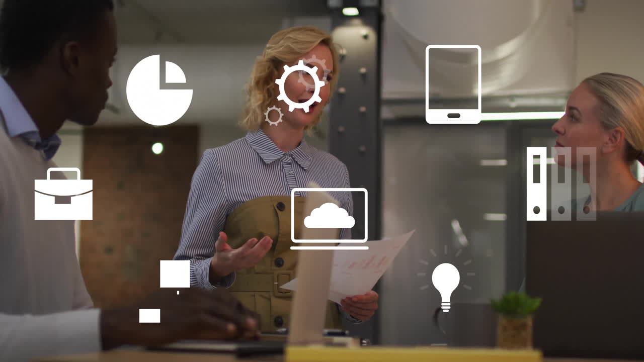 Animation of business icons and data processing over diverse business people in office