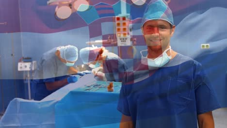 Animation-of-flag-of-croatia-waving-over-surgeons-in-operating-theatre