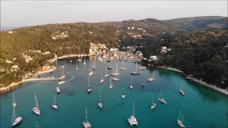 drone flying over blue water and yachts