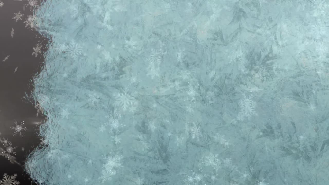 animazione digitale dello sfondo che si congela contro i fiocchi di neve che cadono su uno sfondo grigio