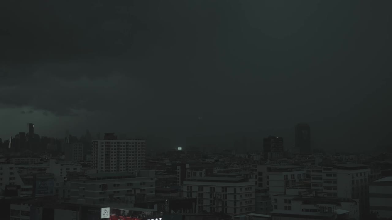 Dramatic Bangkok Monsoon Timelapse of Heavy Downpour and Stratonimbus Clouds Enveloping the City Skyline, Thailand