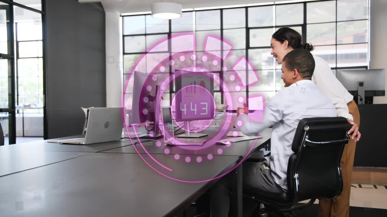 Woman walking to colleague as HUD appearing, pointing at monitor while man analyzing business info