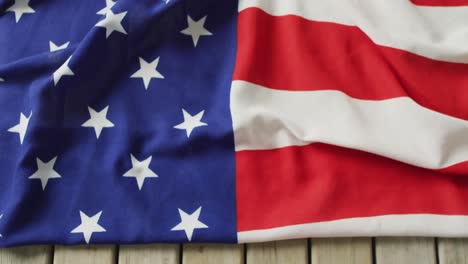 video of flag of usa lying on wooden background