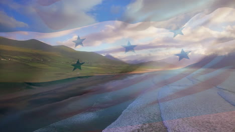 animation of flag of honduras waving over beach landscape, cloudy blue sky and sea