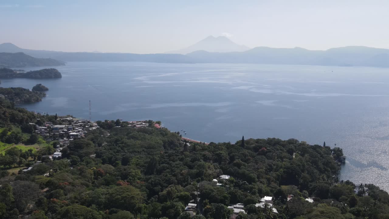 Views of the beautiful Ilopango Lake in El Salvador, with mountains and volcanoes around during the summer