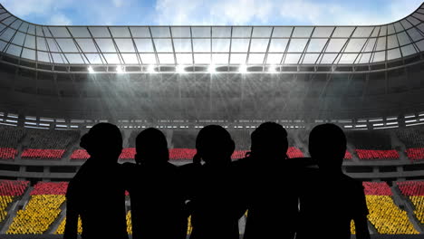 animation of silhouettes of team of sports women with german flag over sports stadium