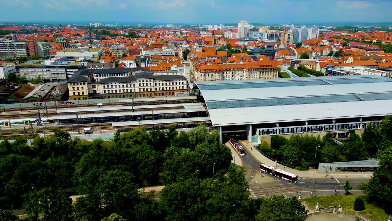 4K Aerial Drone Video of Busses Departing the Train Station in Downtown Erfurt, Germany
