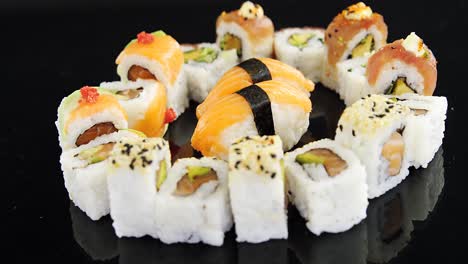 Various-sushi-on-black-background