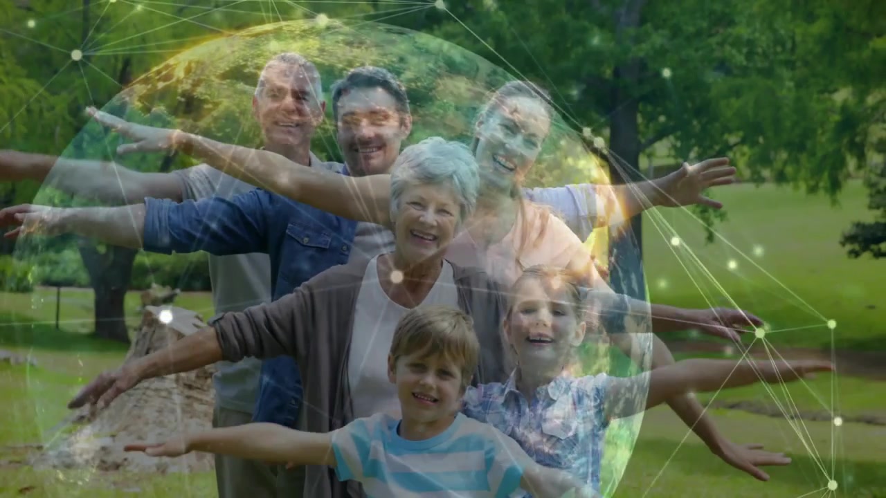 Video vertical: Familia posando en un parque mientras se desvanecen de forma etérea, con nodos de un globo terráqueo recorriendo la pantalla, mostrando tecnología