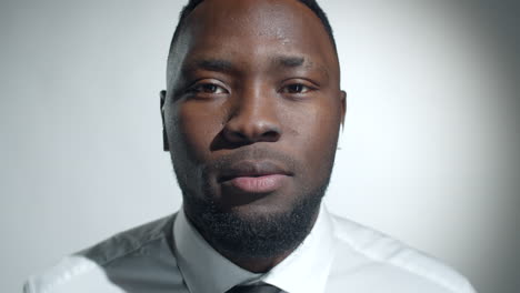 portrait of young black man in studio