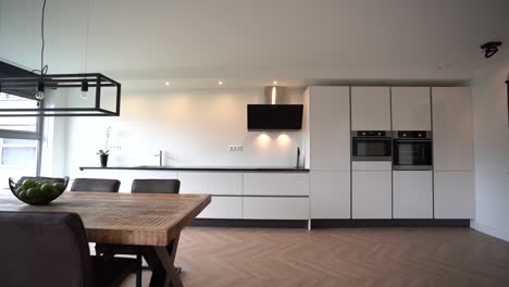 interior of spacious kitchen with dining area