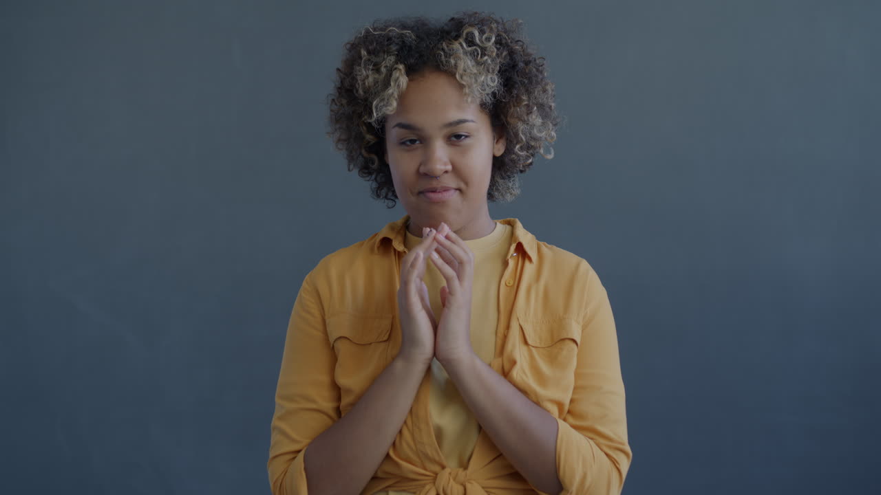 Woman with Curly Hair Praying