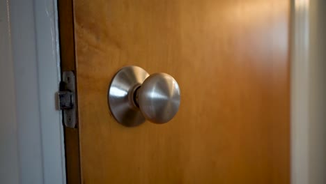 door-knob-silver-on-a-door