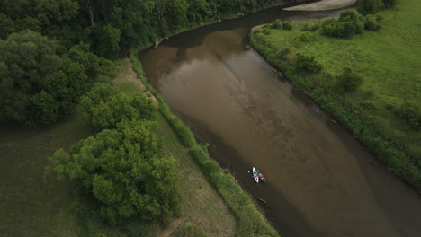 kayaks on calm zumbro river in oronoco, minnesota, usa - aerial drone shot