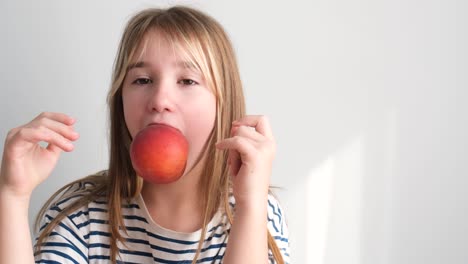 a little girl is having breakfast in the kitchen at home a little girl is having breakfast in the kitchen at home she is having fun and doesnt want to go to school naughty child
