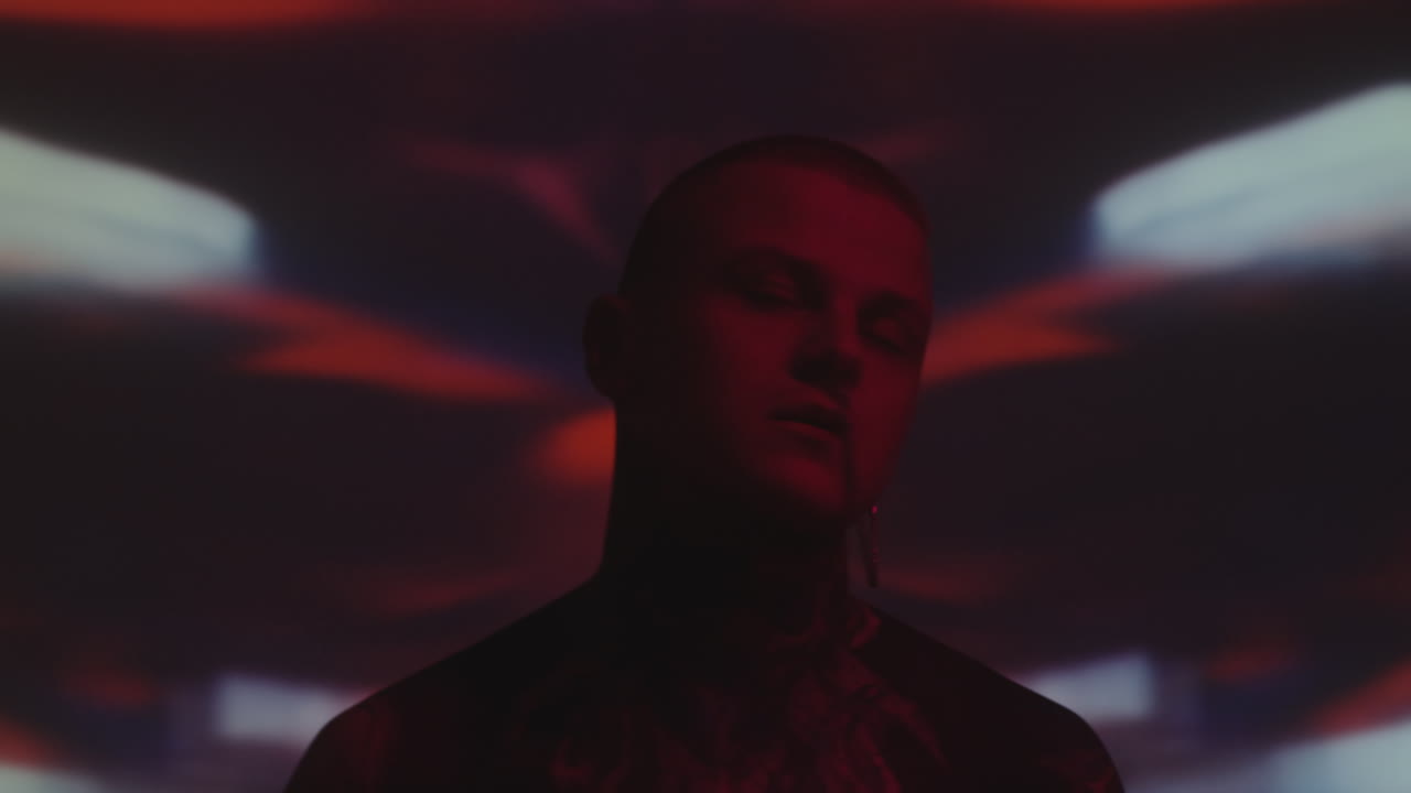 Man with Nose Chain and Tattooed Body Dancing