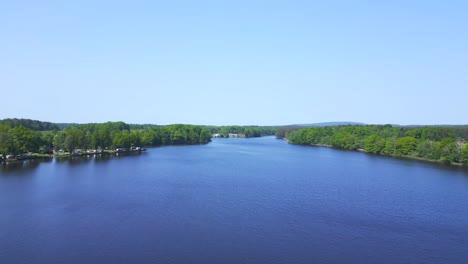 stunning aerial top view flight natural summer paradise idyllic island in lake, chlum in czech, day 2023