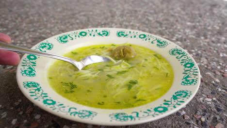 traditional soup on a concrete table