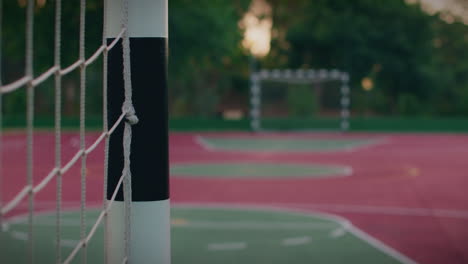 outdoor-court-goal-net-and-frame-detail-medium-slow-motion-gimbal-shot