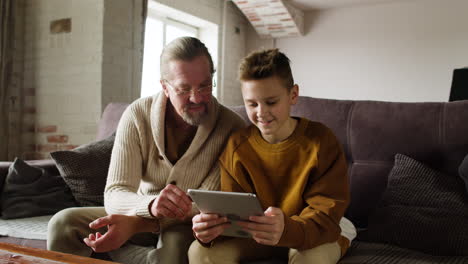 Caucasian-man-and-boy-in-the-living-room