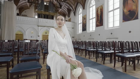 bride sitting in a church