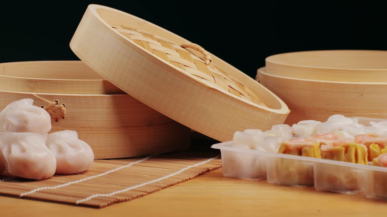 Various of frozen dim sum close-up macro. Food to take away. Chinese dessert food. Dimsum with shrimps, fish and meat. Dish in a cafe. Delivery