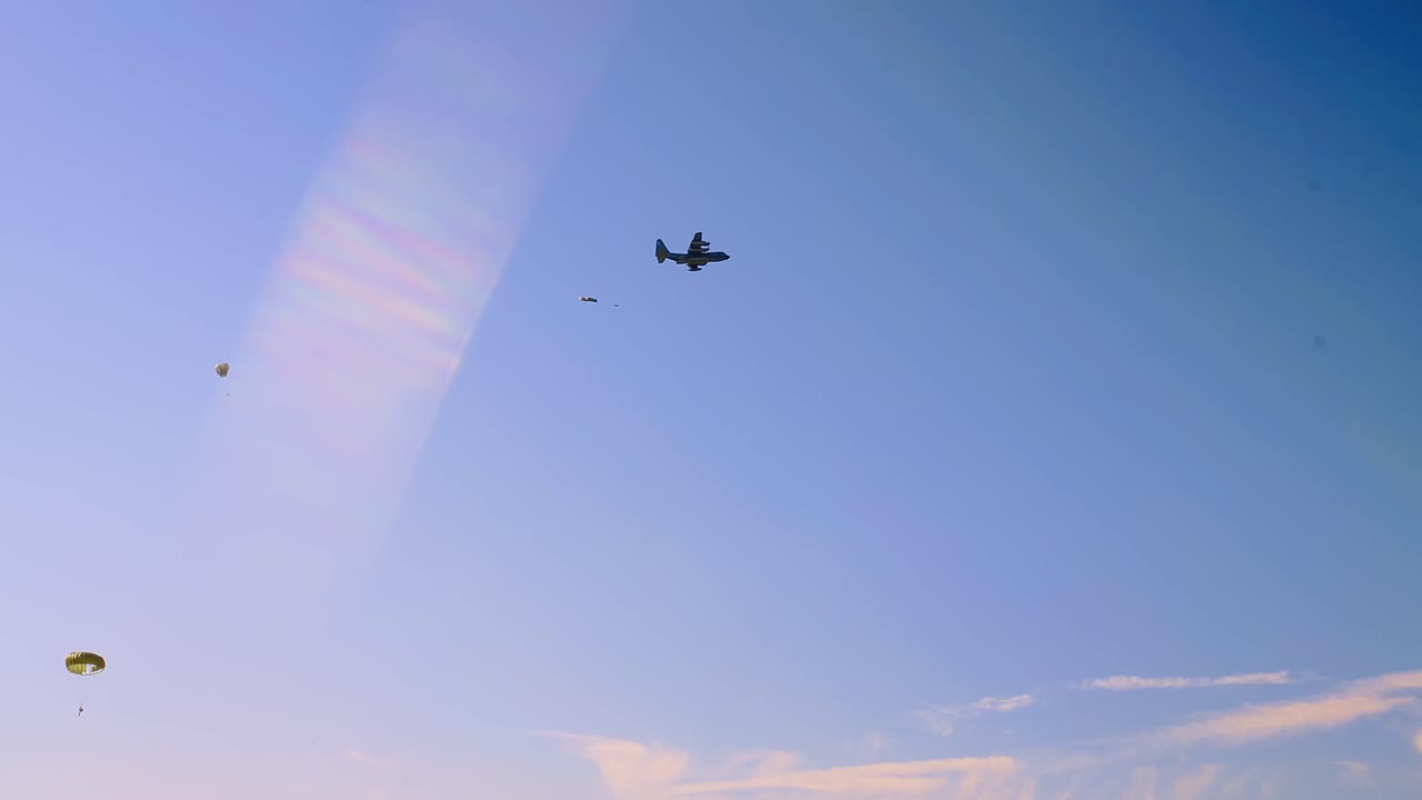 Paratroopers Jumping from Airplane