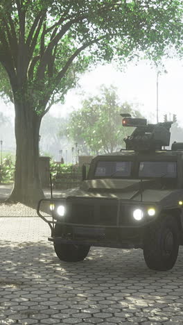 military vehicle parked in a serene park during a bright sunny day