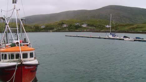 A-shot-of-a-fishing-vessel-docked-on-a-pontoon