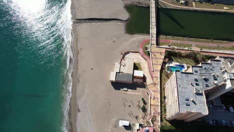 Drone-Slowly-Looks-Over-Beach-in-Fuengirola,-Spain