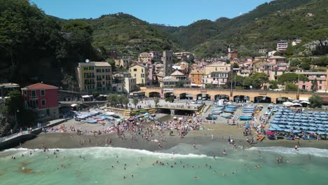 fixed aerial view above monterosso beach in cinque terre, italy