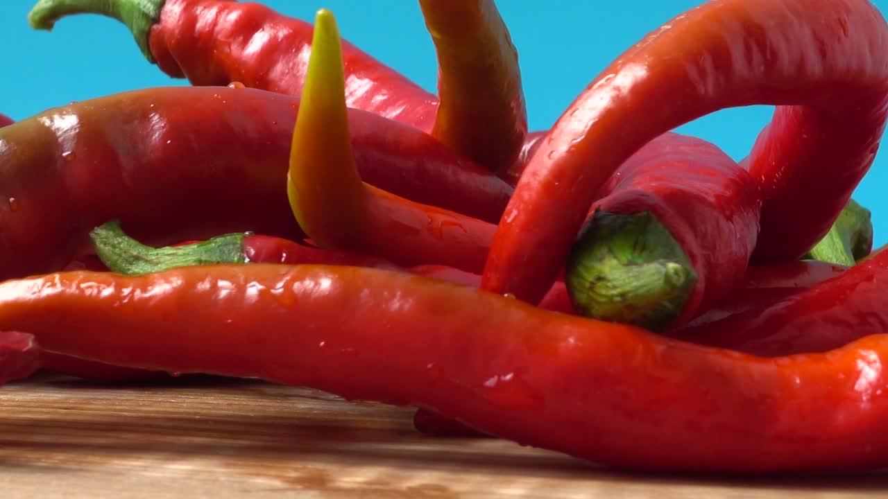 Red chilli, pepper. Shooting in the movement