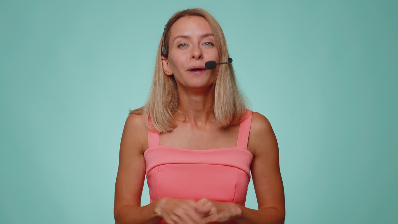 Woman wearing headset freelance worker call center or support service operator helpline having talk