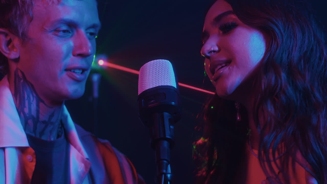 Famous Duo Recording New Song for Their Clip in Neon Light with Laser Beams