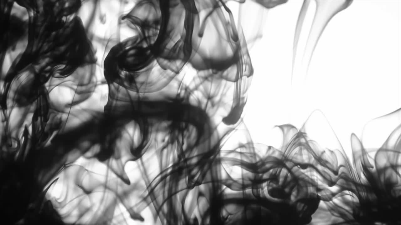 Abstract Black Ink Spreading and Dissolving in Water