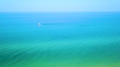 boat on tropical turquoise waters