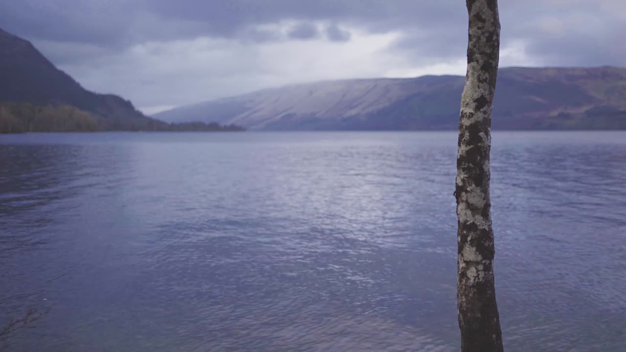Blue Lake in the Mountains in Scottish Highlands on a Cloudy Day