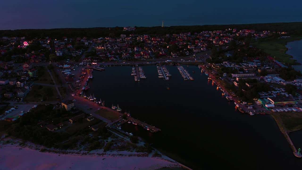 Beautiful Night color sky, sunset by the Baltic Sea, Jastarnia, Poland. Harbor. Aerial View