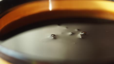 pouring liquid into bowl