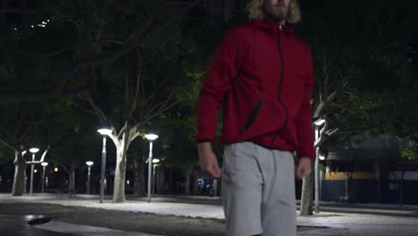 sporty caucasian man training on the street
