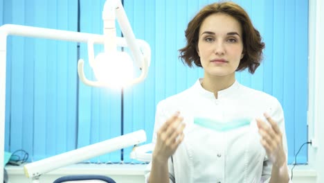 dentist adjusting mask
