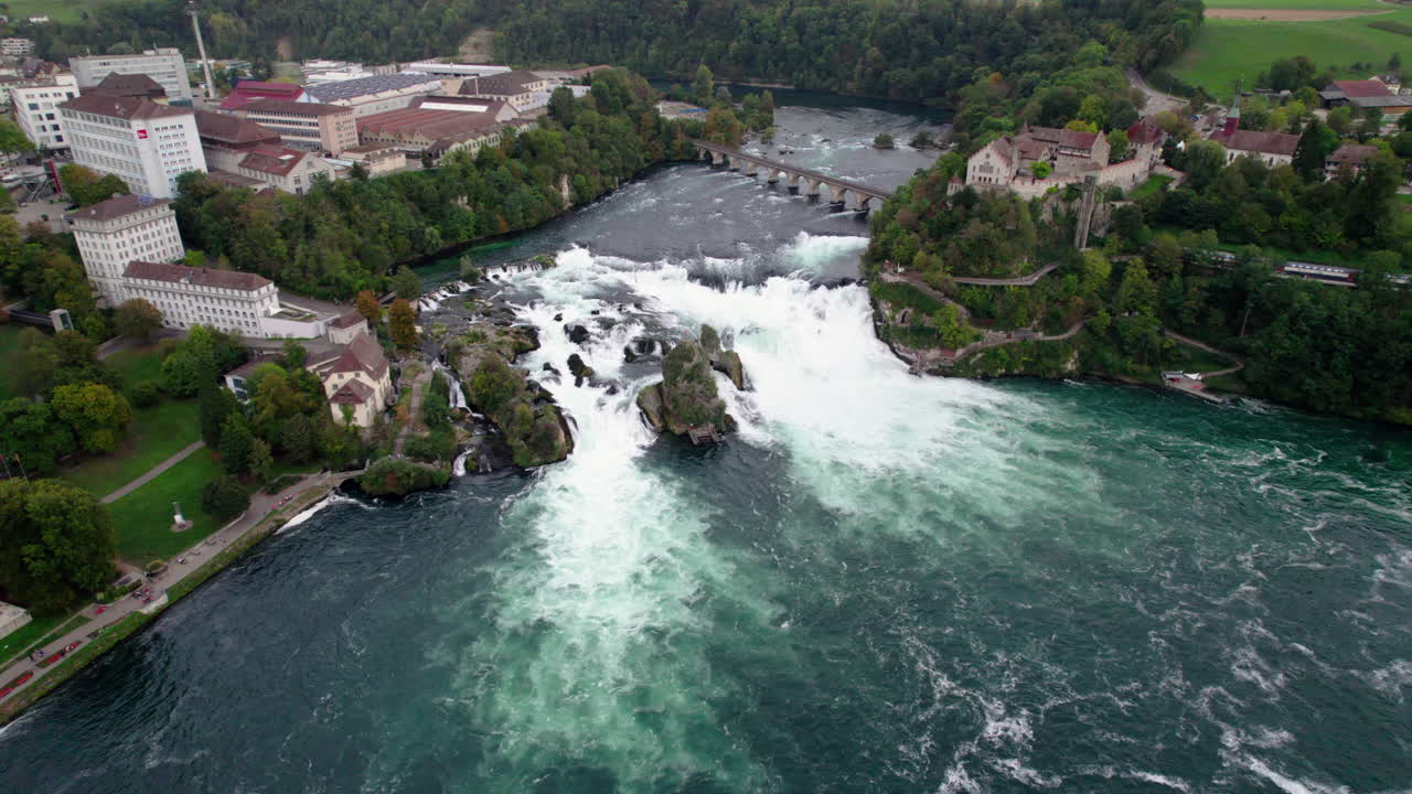 Aerial of Rhine Falls with castle and bridge, Schaffhausen, Switzerland
