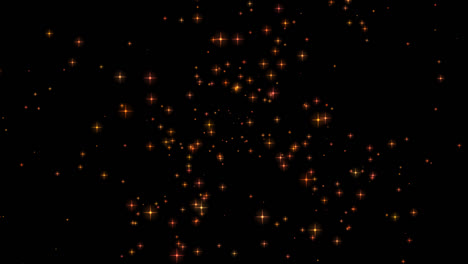 orange sparkling stars on black background