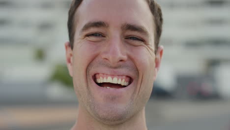 close-up-portrait-happy-young-man-laughing-tourist-enjoying-successful-vacation-lifestyle-independent-male-student-summer-travel