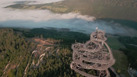 aerial view of a spiral observation tower on a mountaintop