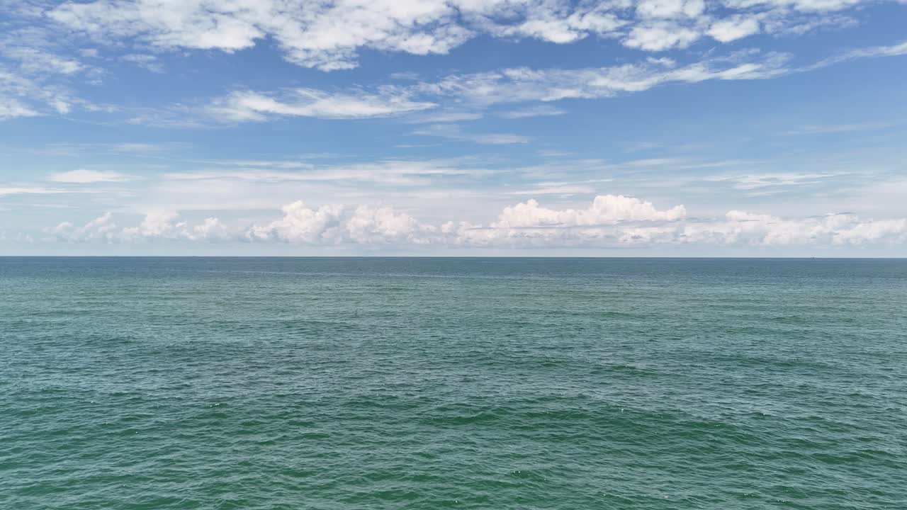 Low Aerial View Dolly of Clouds at the Sea in Ho Tram in the Afternoon