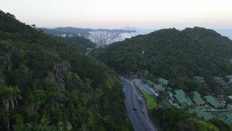 Aerial-view-of-sunset-over-the-two-hills-of-Balneario-Camboriu-and-Praia-Brava-in-Brazil