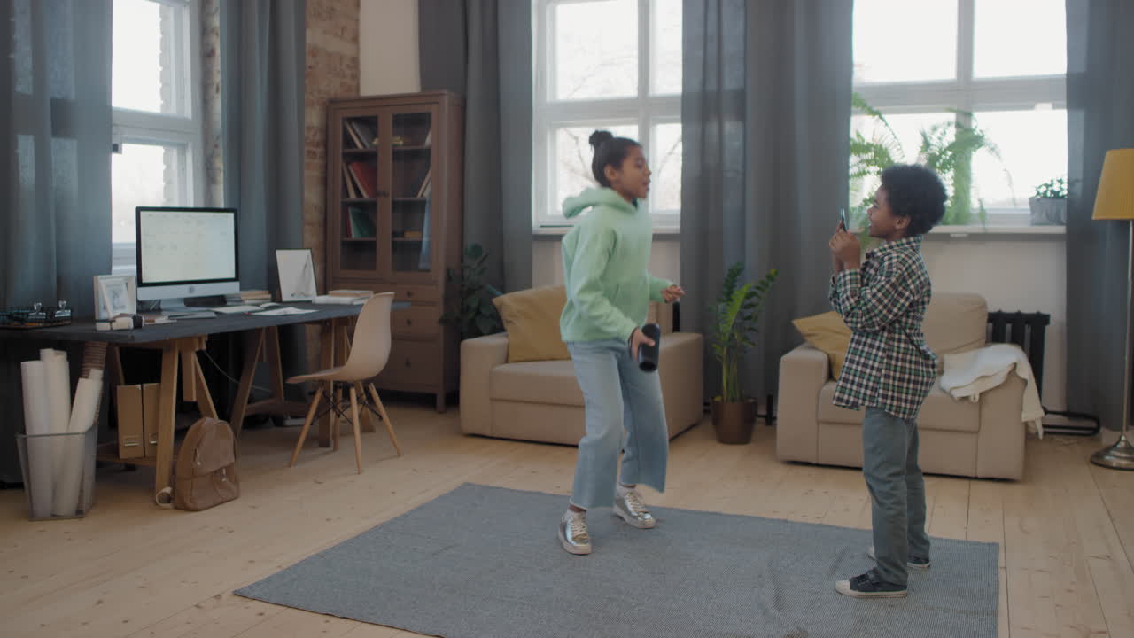 Afro Kids Dancing To Music At Home